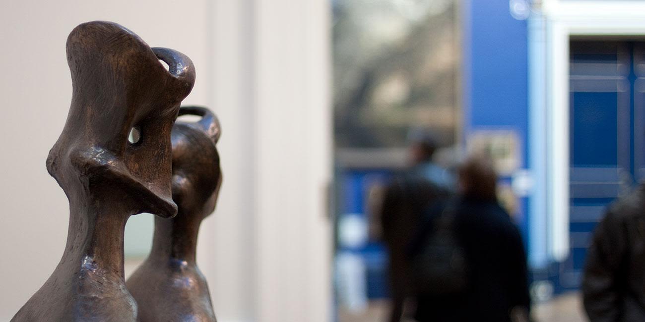 A view of part of a dark-coloured sculpture at Leeds Art Gallery.