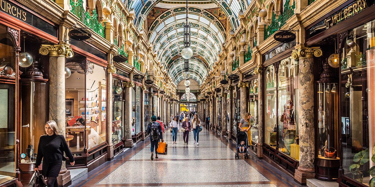Rows of shops in the ornately decorated Victoria Arcade.