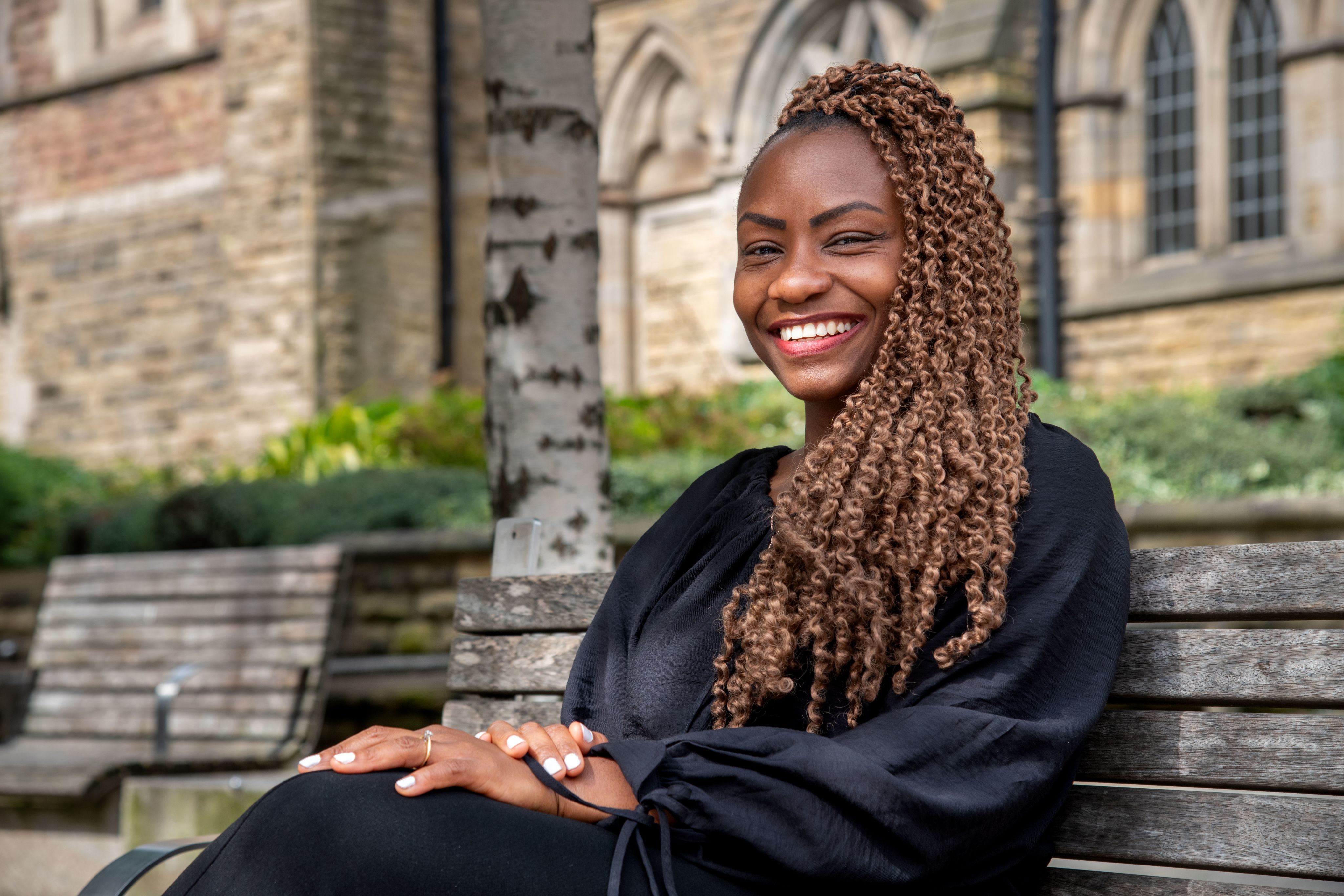 Emillie sat looking into distance