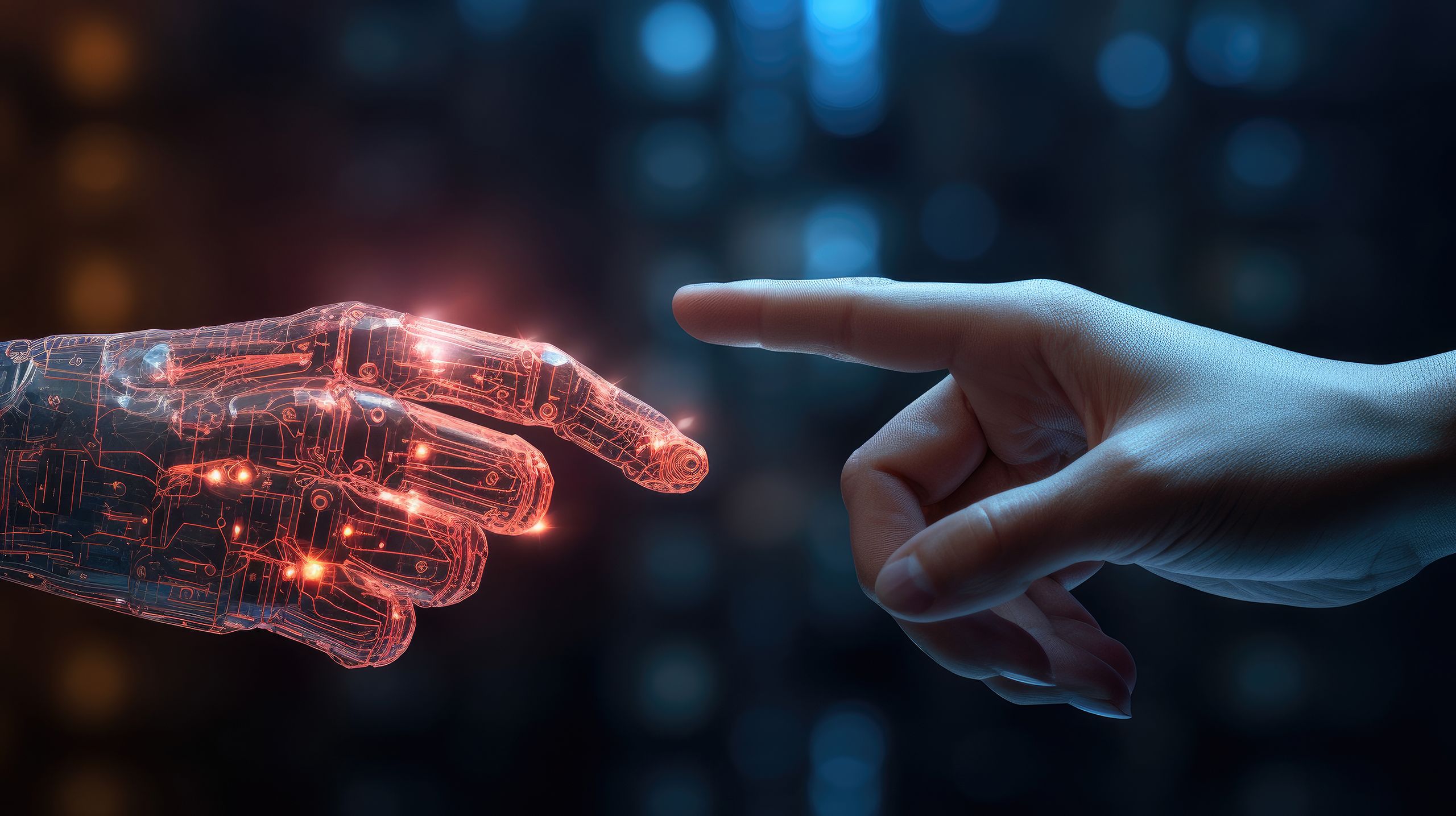 A hand and a robot hand with their index fingers extended