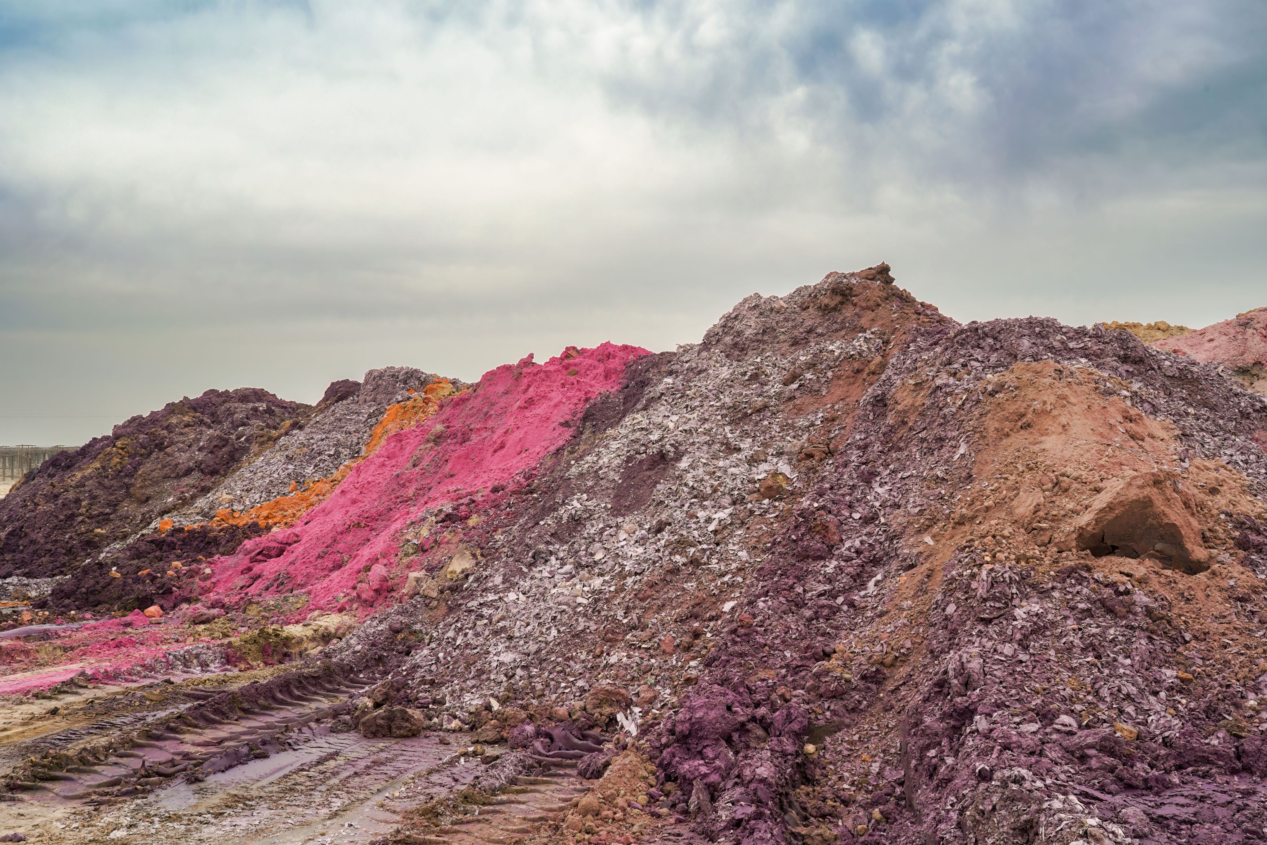 Piles of grape pomace, or marc, which consists of the solid remains of grapes, including grape skins, stems, and seeds, after pressing for juice or wine