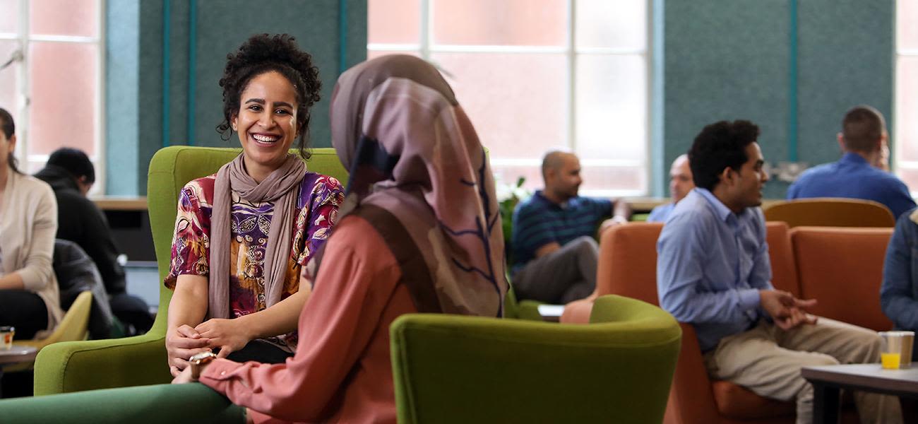 International students talking in Leeds University Union.