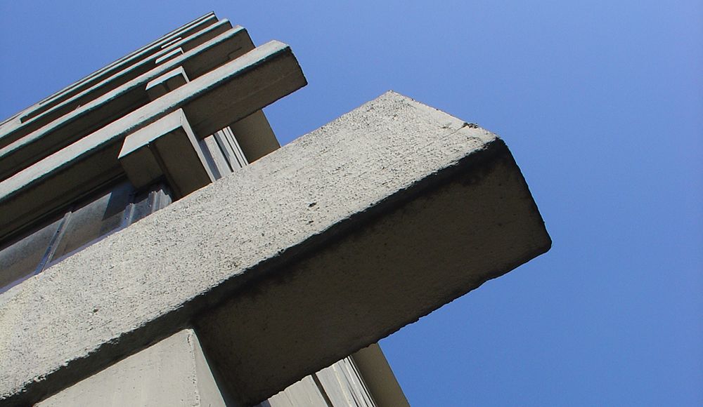 Concrete beams extending from the end of the EC Stoner Building