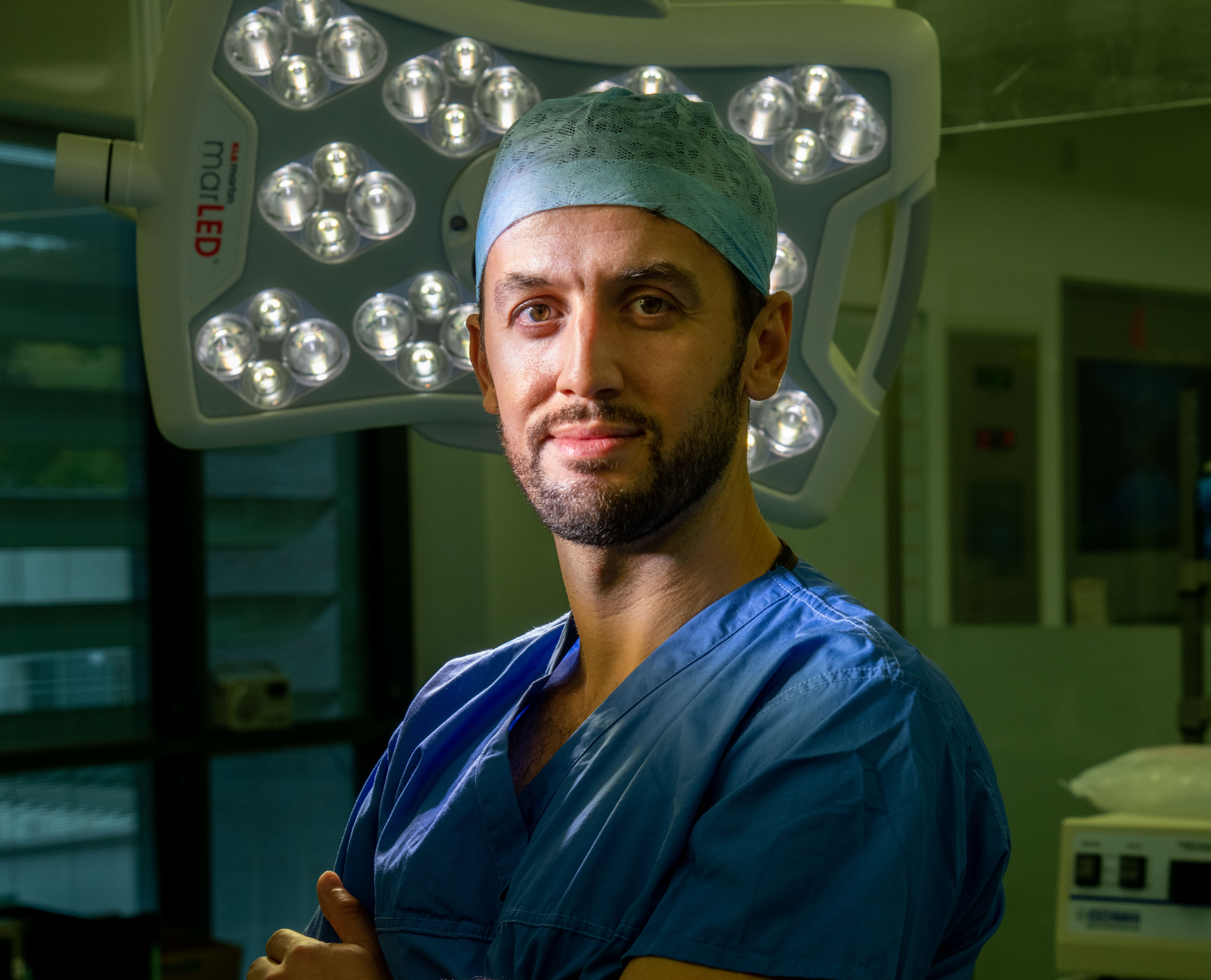 Moez Zeiton stands in operating theatre