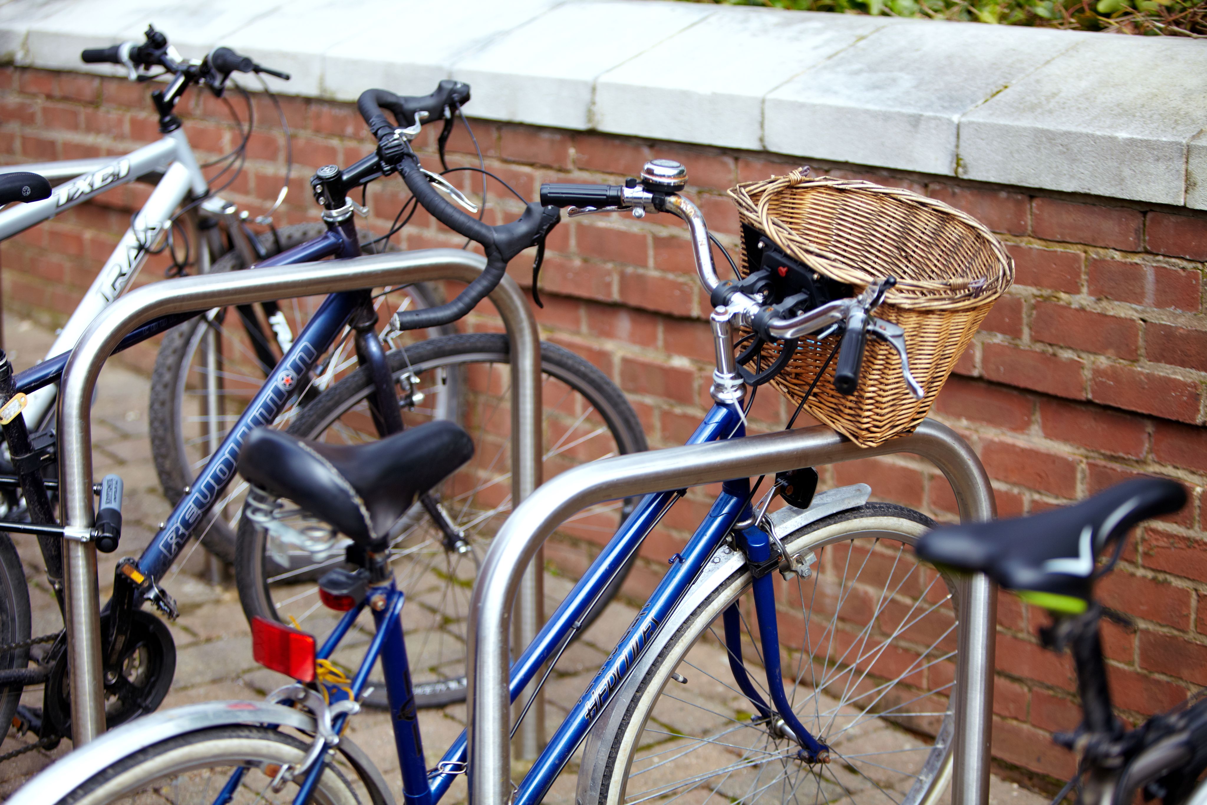 Bicycles parked at bike racks.