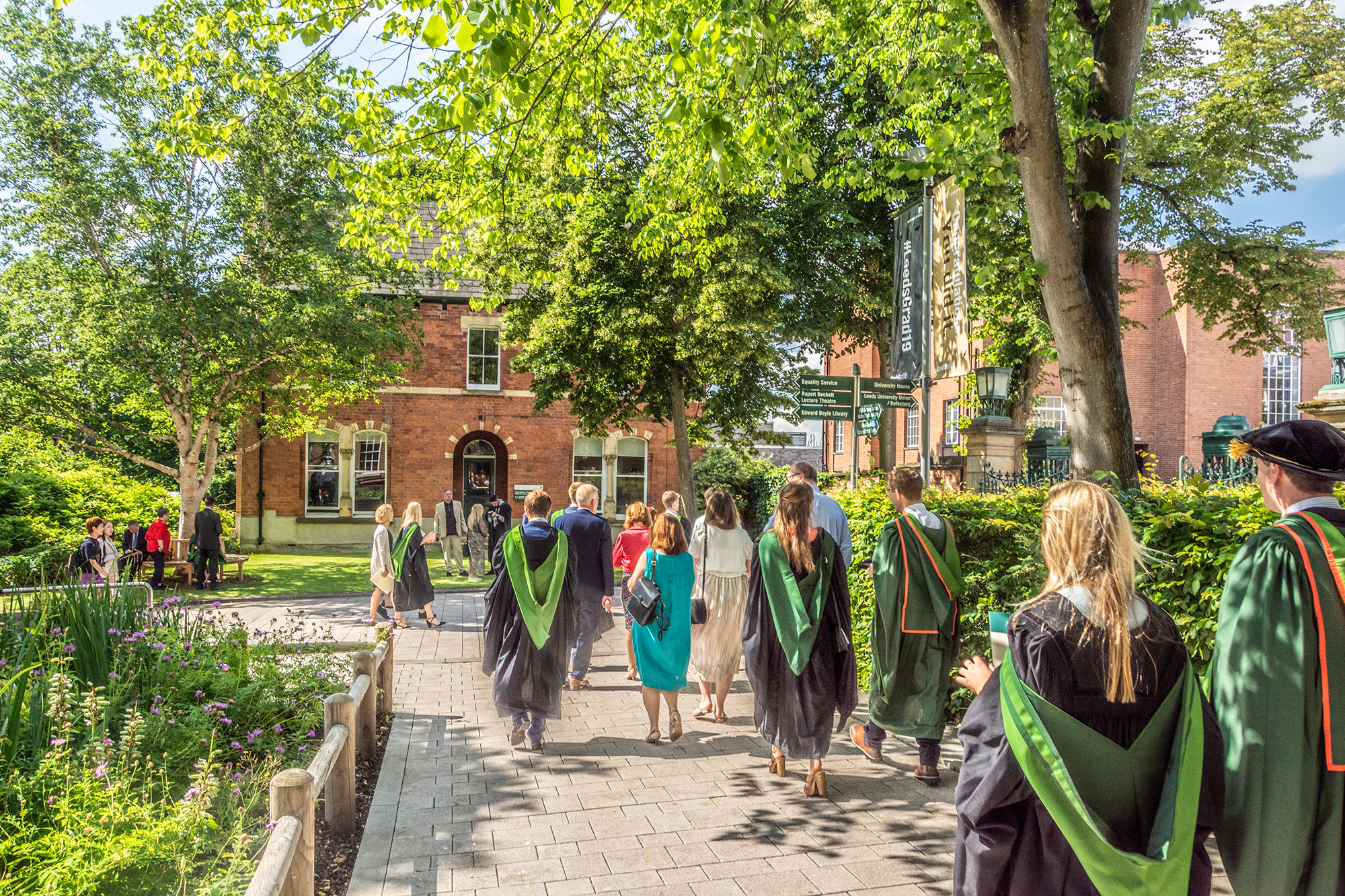 Graduates congregate on campus during graduation