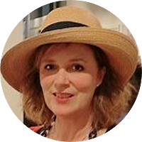 Sarah Morley wearing a large hat