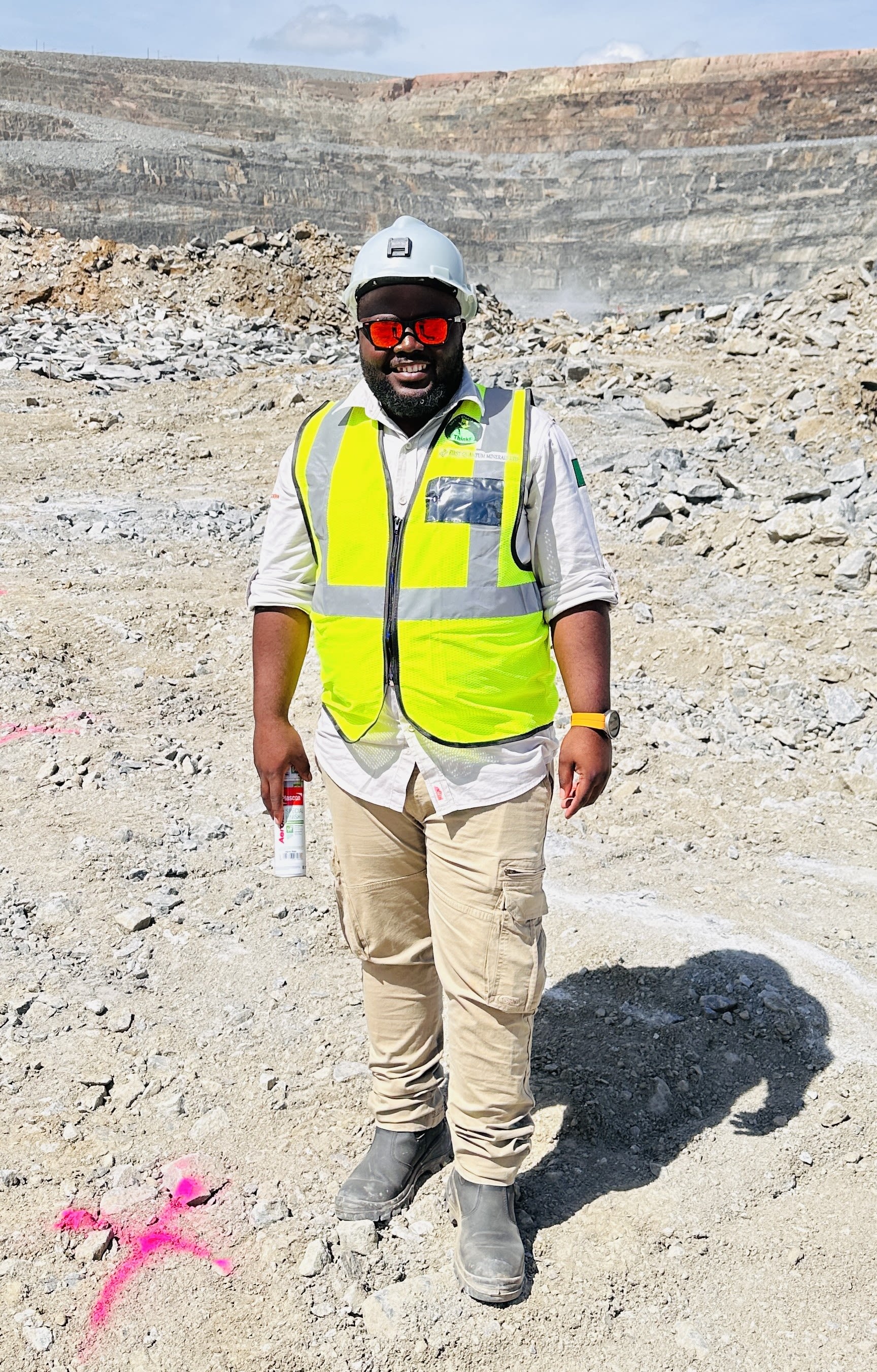 man in high visibility jacket and hard hat