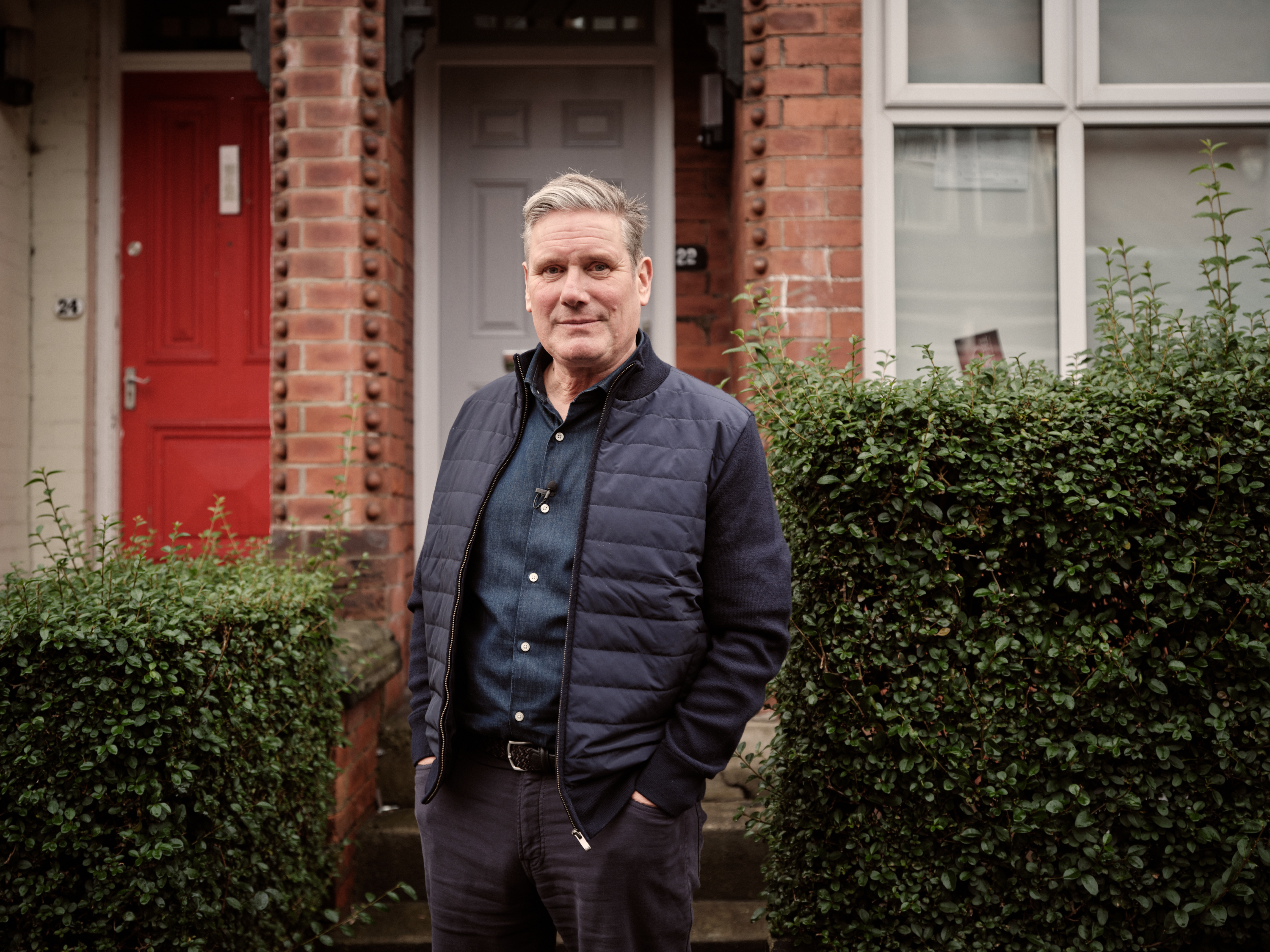 Keir Starmer stands outside his old student house