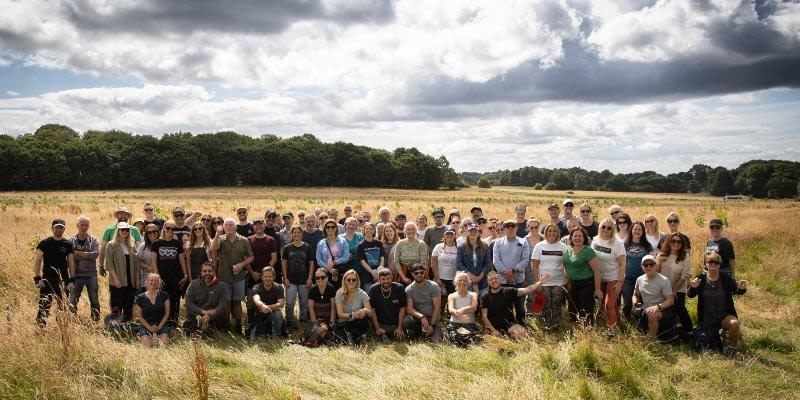 Group of people gather for a large photo
