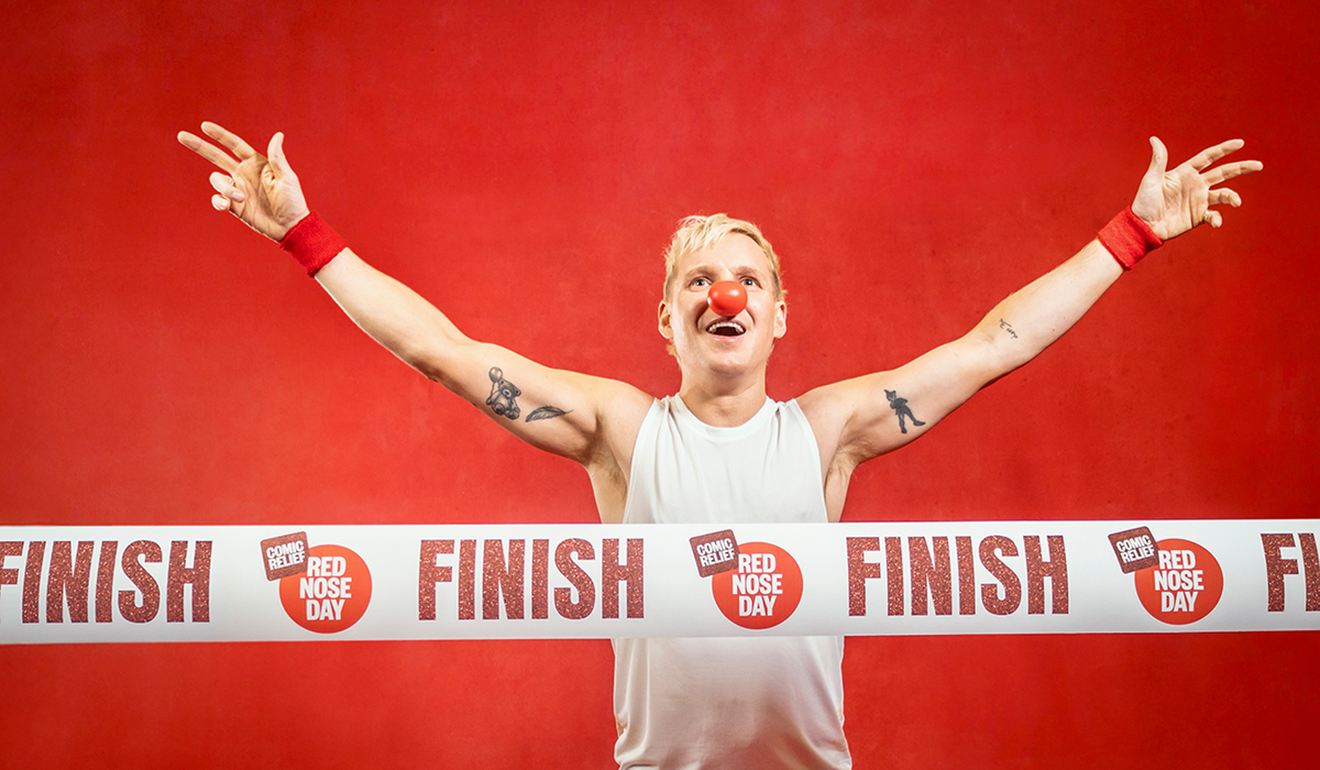 Jamie Laing crosses a Red Nose Day finish line