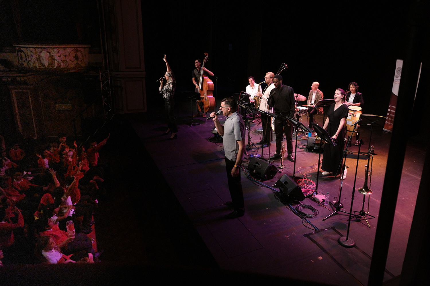 A band perform on stage