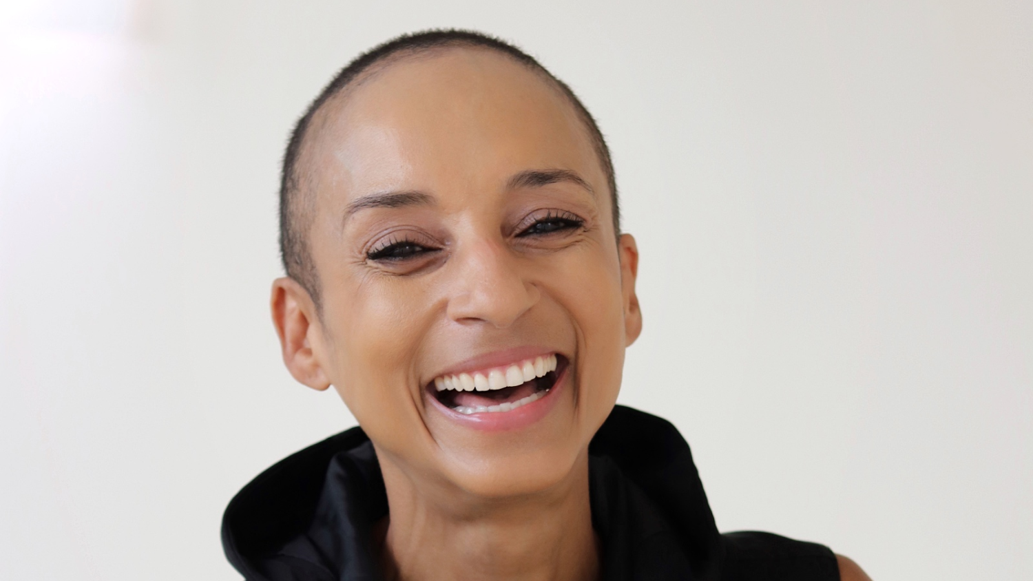 Adele Roberts laughing in a headshot image