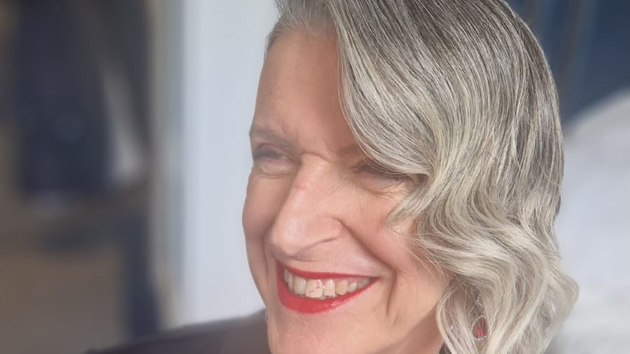 Jay Woolley laughing in their profile image