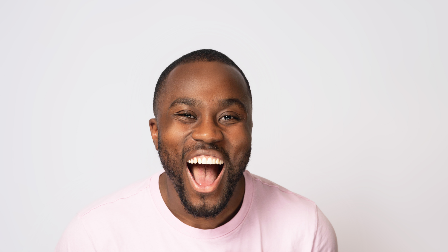Craig Poku laughing in profile image