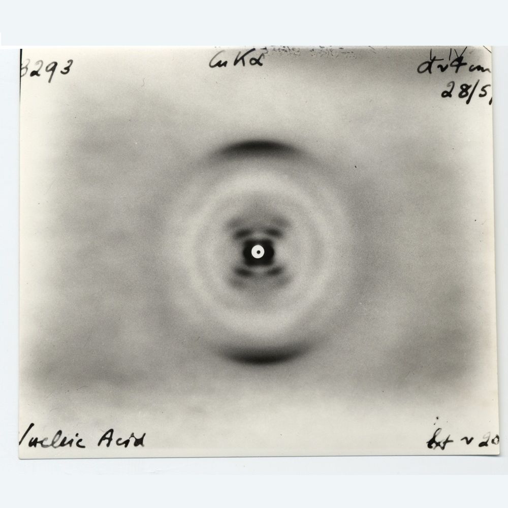 An x-ray image of DNA with handwritten notes in the corners