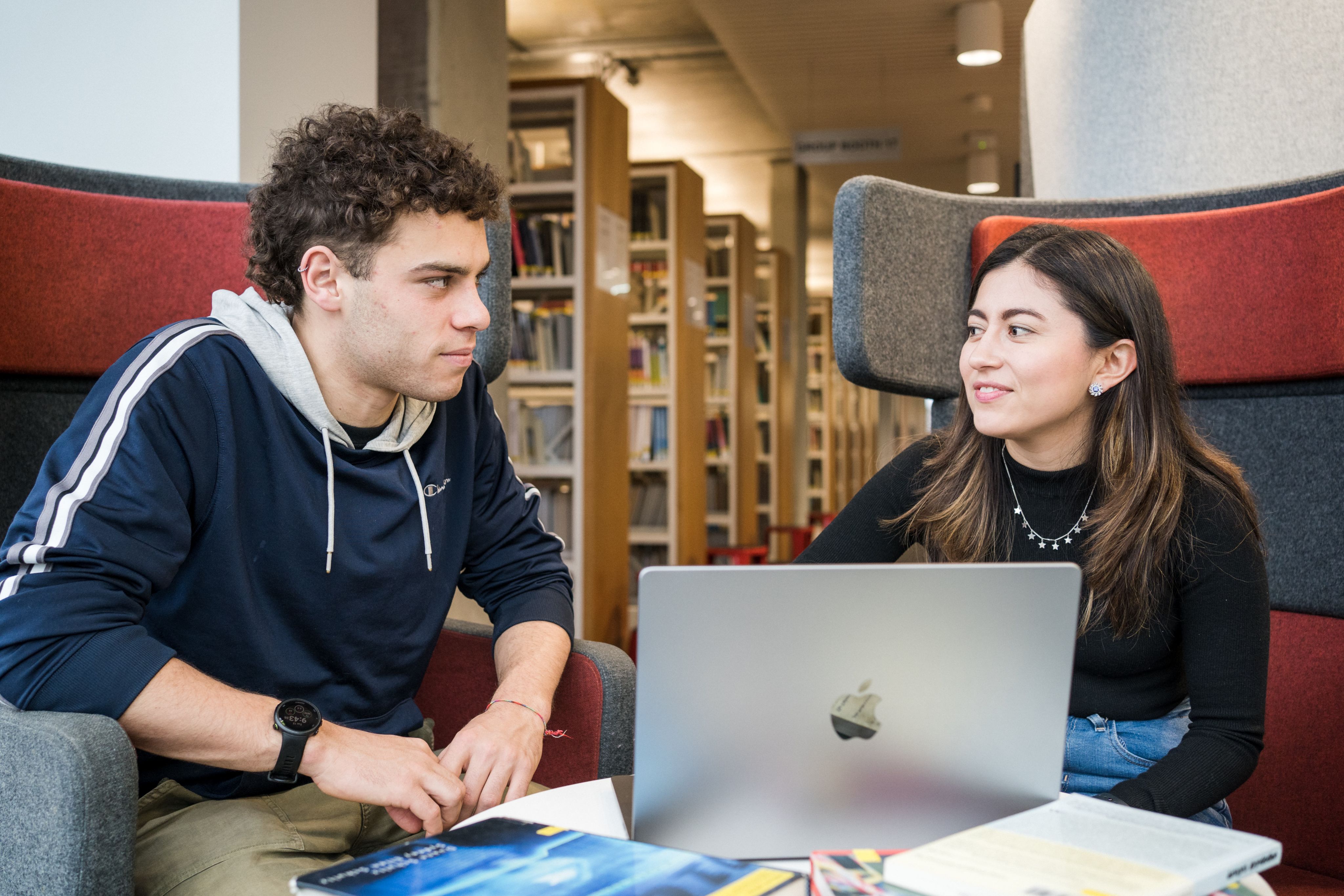 Students working collaboratively in the library