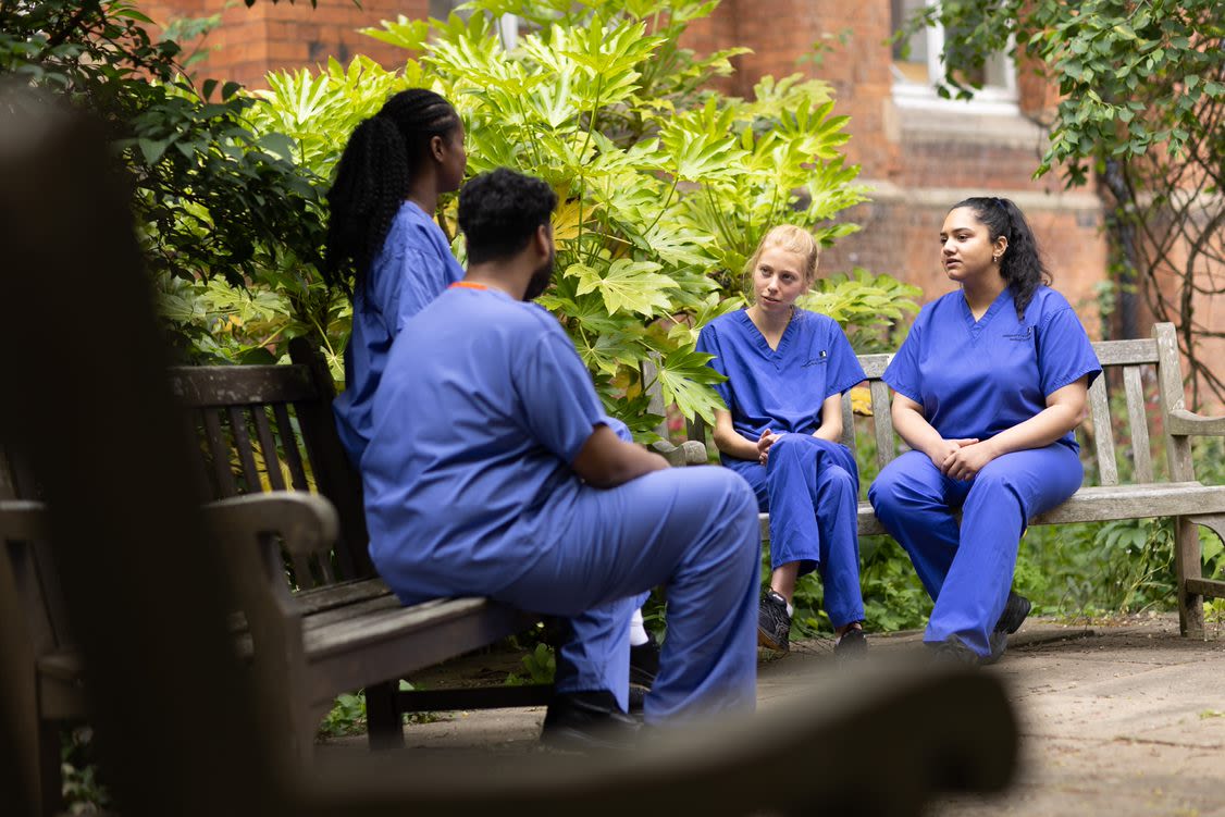 Medical Students sat in Clothworkers Court