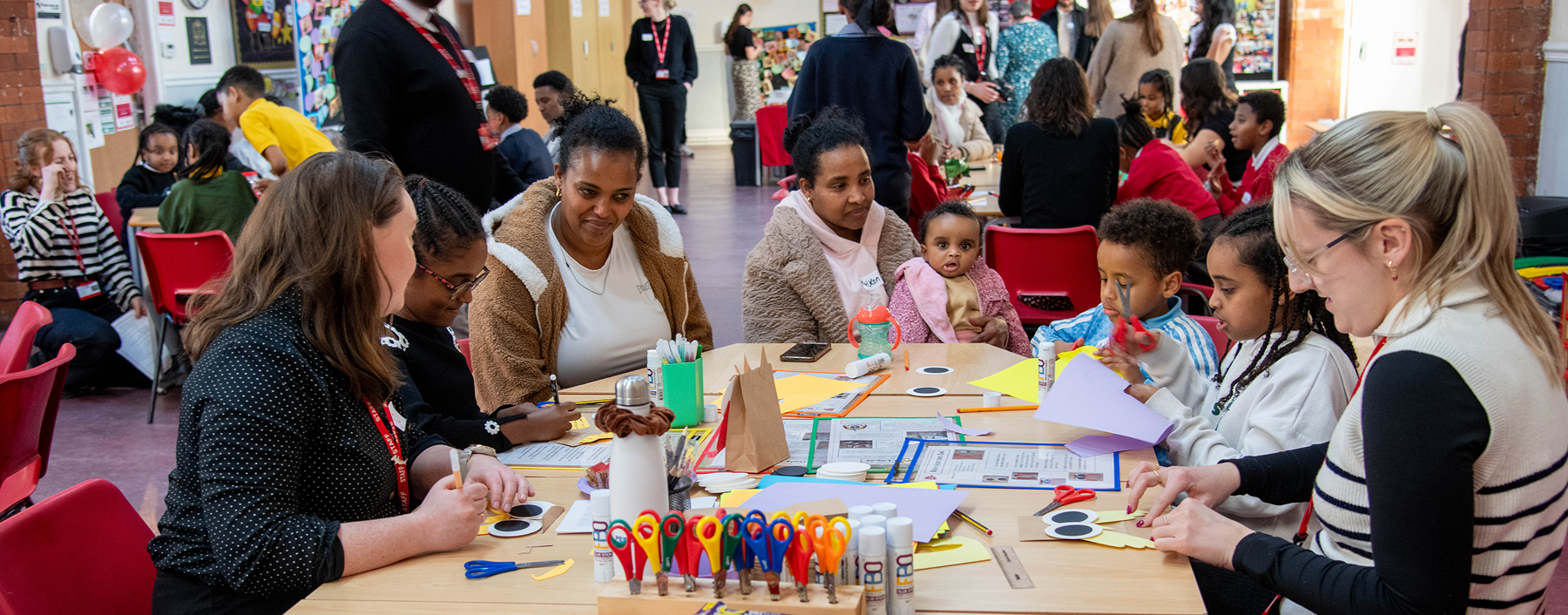 Children playing with crafts in a classroom