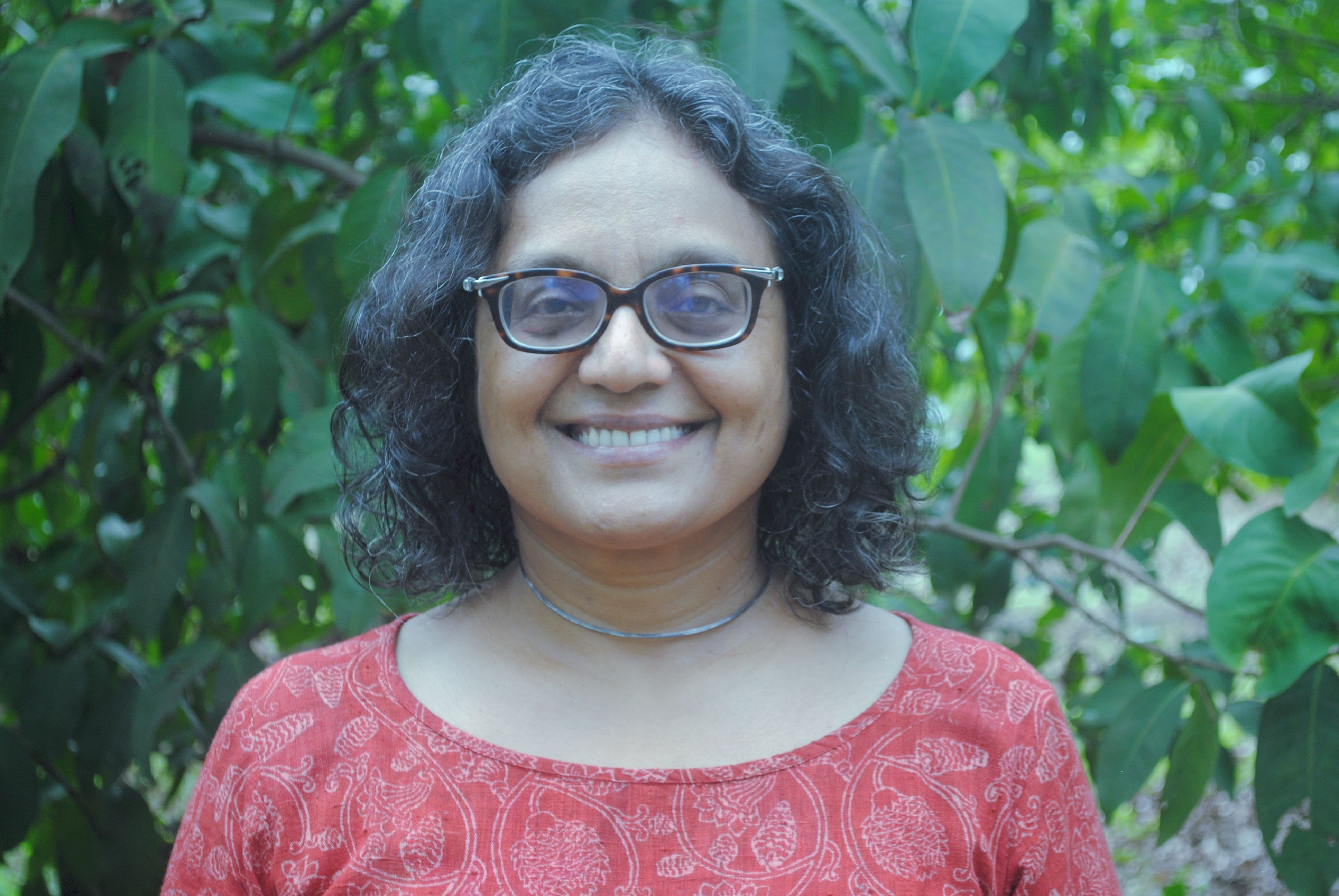 Headshot of Meena Menon