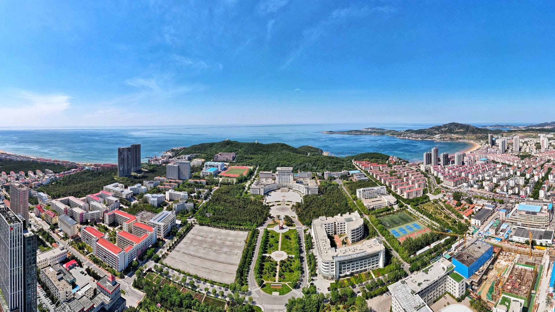 a university campus in China with sea and sky in the background.
