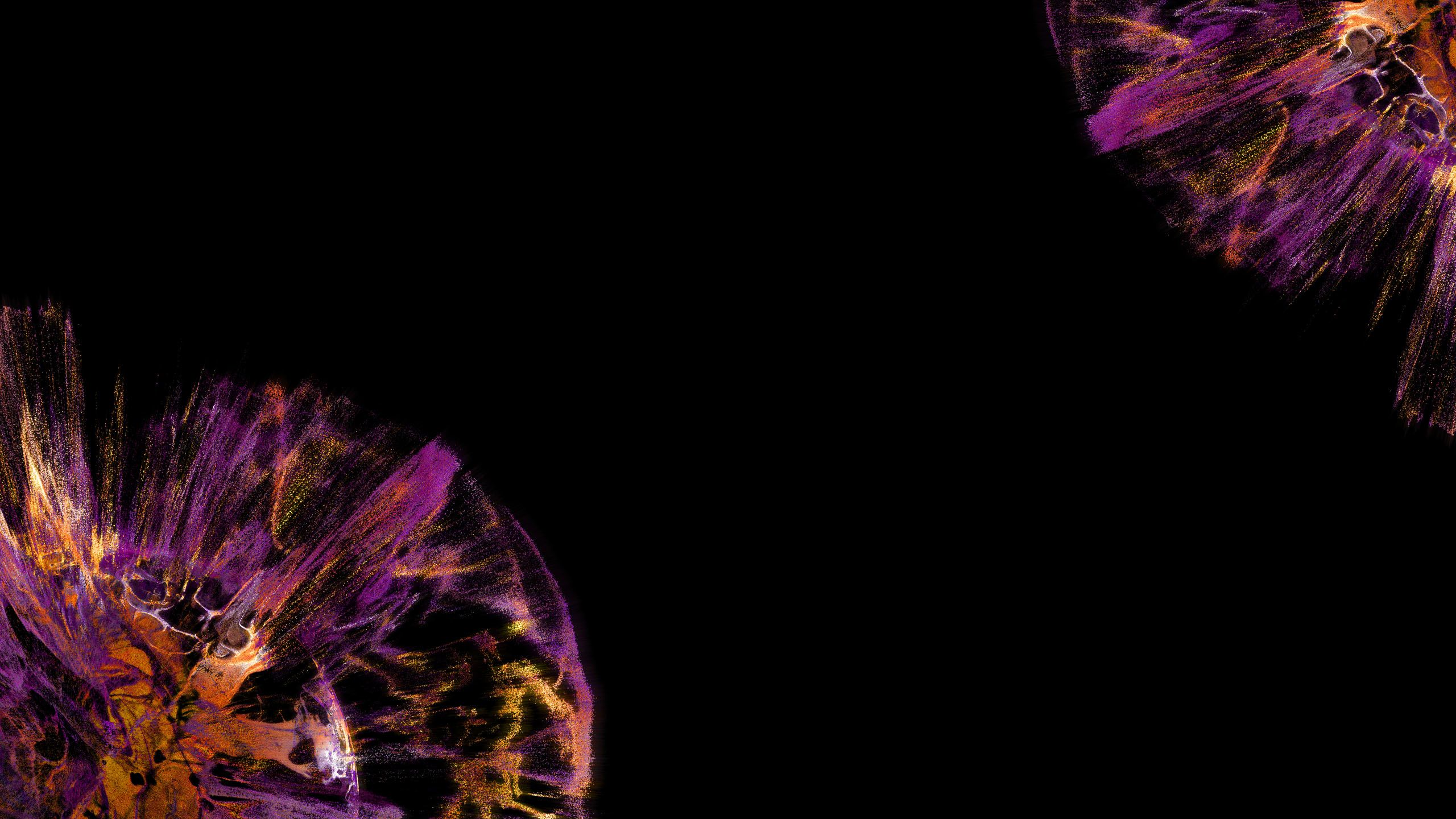 Orange and purple splashes on a black backdrop