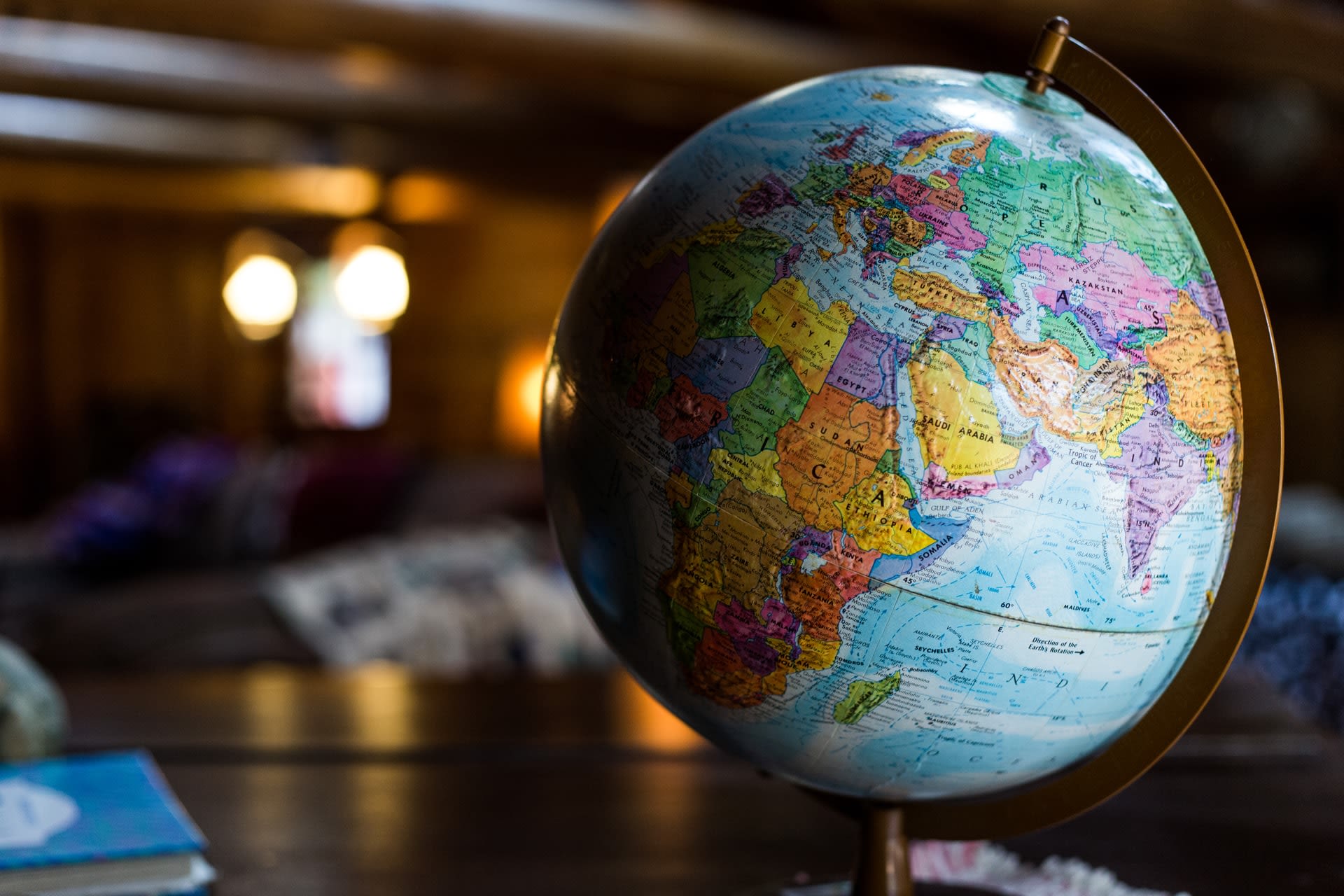 A colourful globe with a map of the world on it.