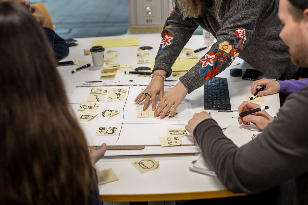 Students working together in the Leeds University Business School.