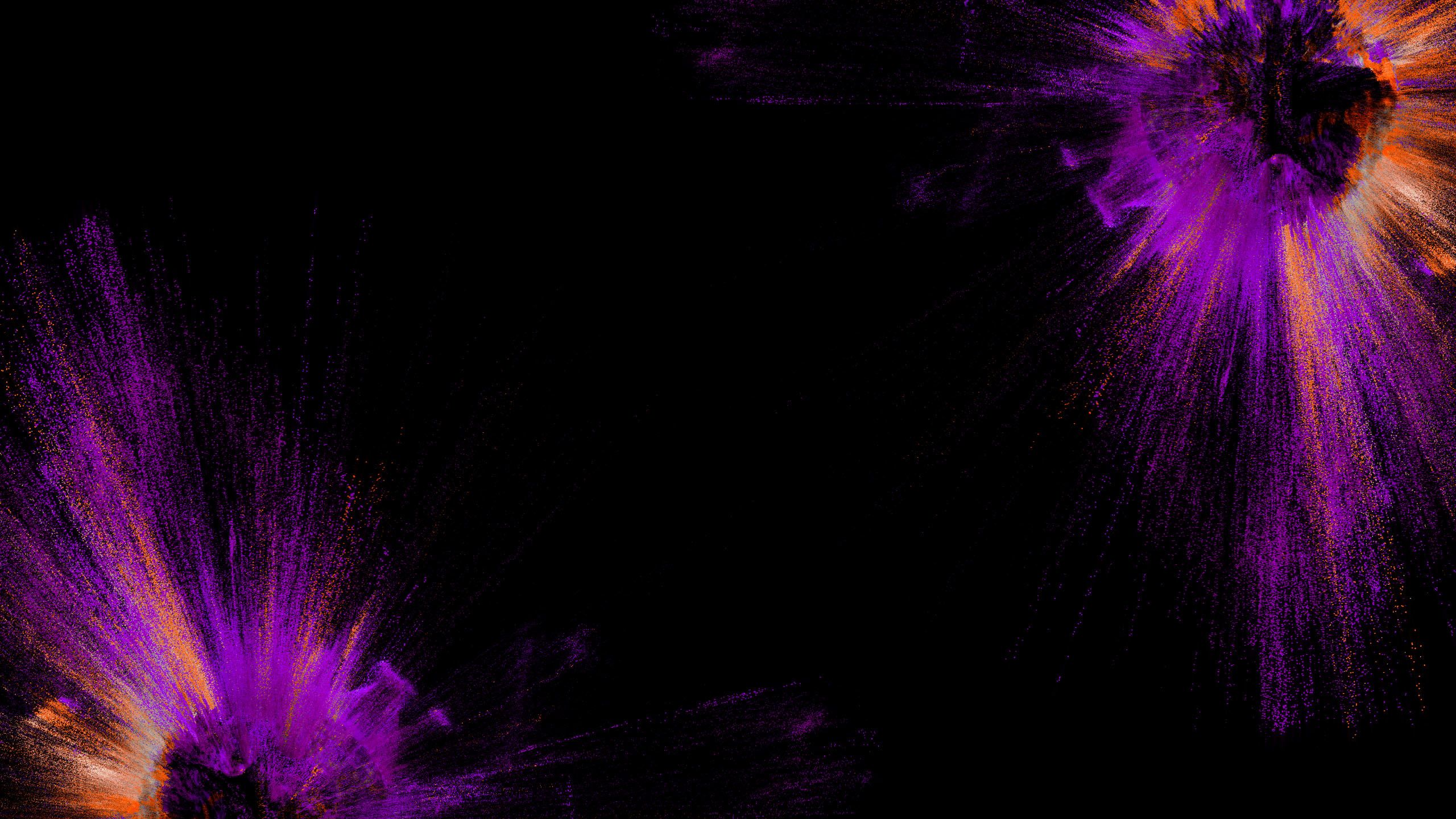 Orange and purple splashes on a black backdrop
