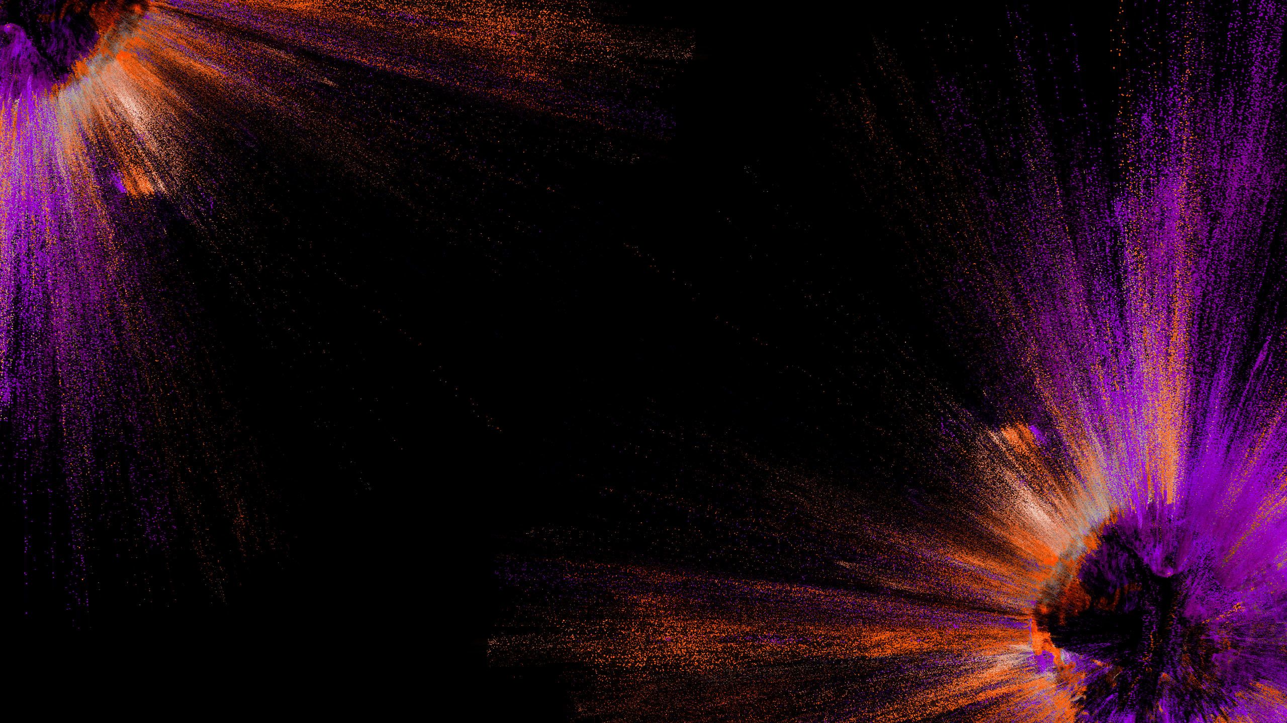 Orange and purple splashes on a black backdrop